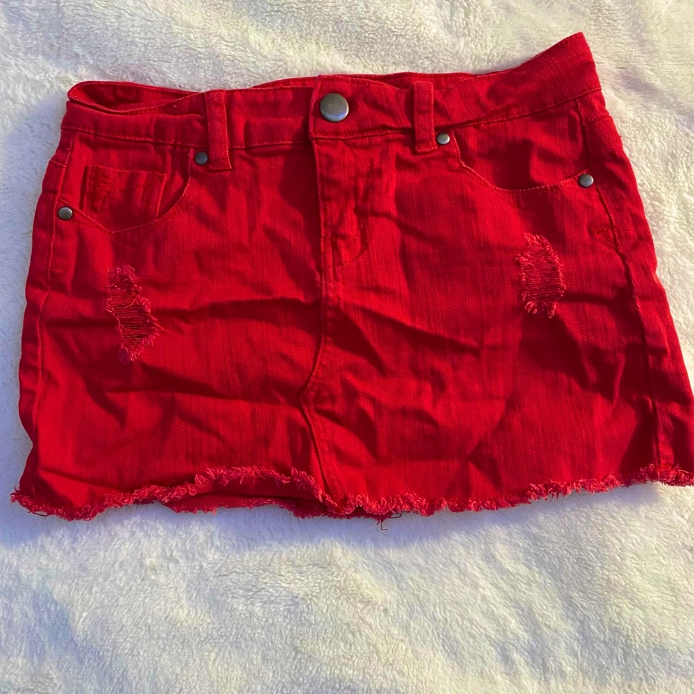 Short red jean skirt